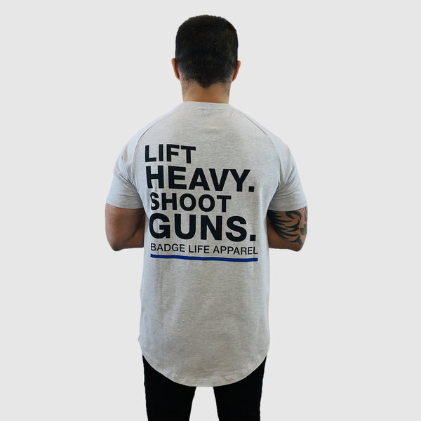 Lift Heavy. Shoot Guns T-Shirt